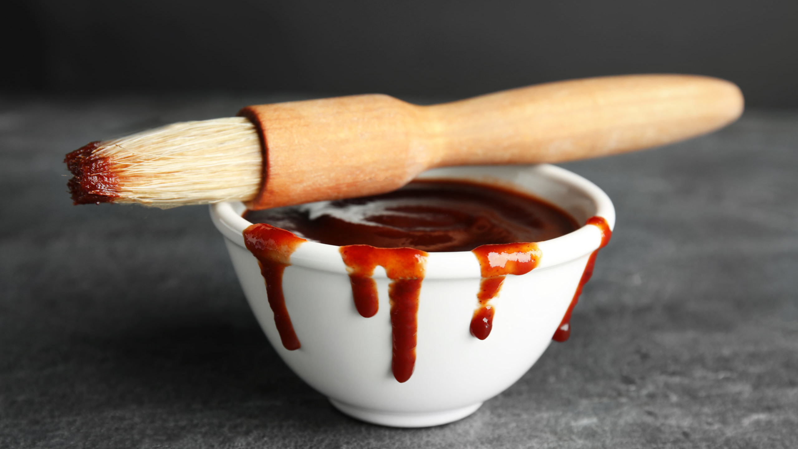 A bowl of cannabis-infused Chocolate Barbecue Sauce featuring Nove Cafe Cappuccino bar