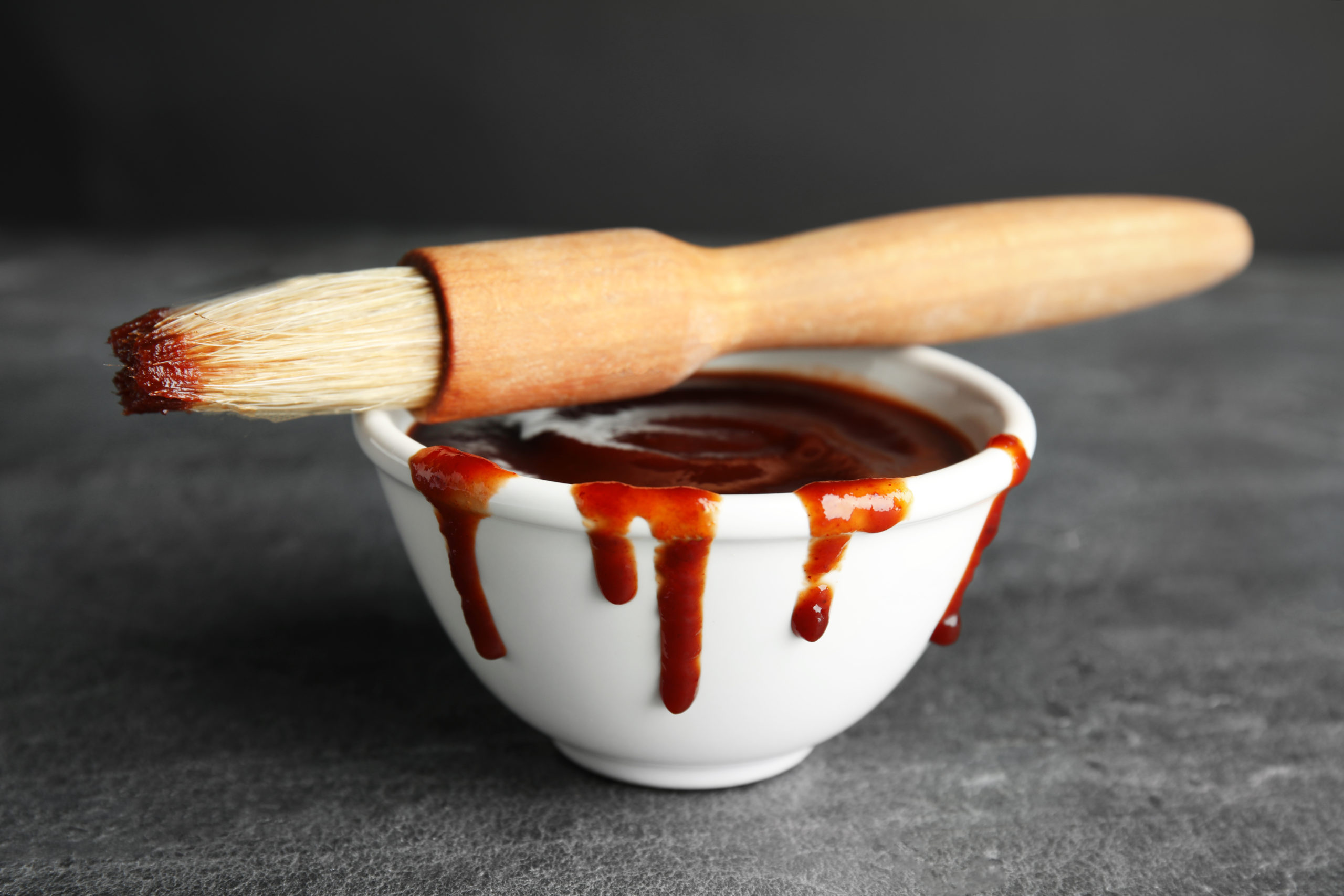 A bowl of cannabis-infused Chocolate Barbecue Sauce featuring Nove Cafe Cappuccino bar
